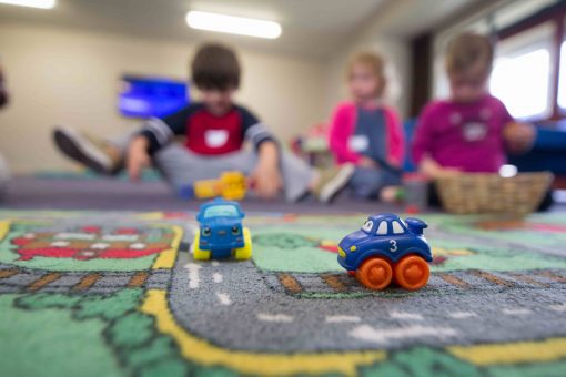 toy cars on play mat